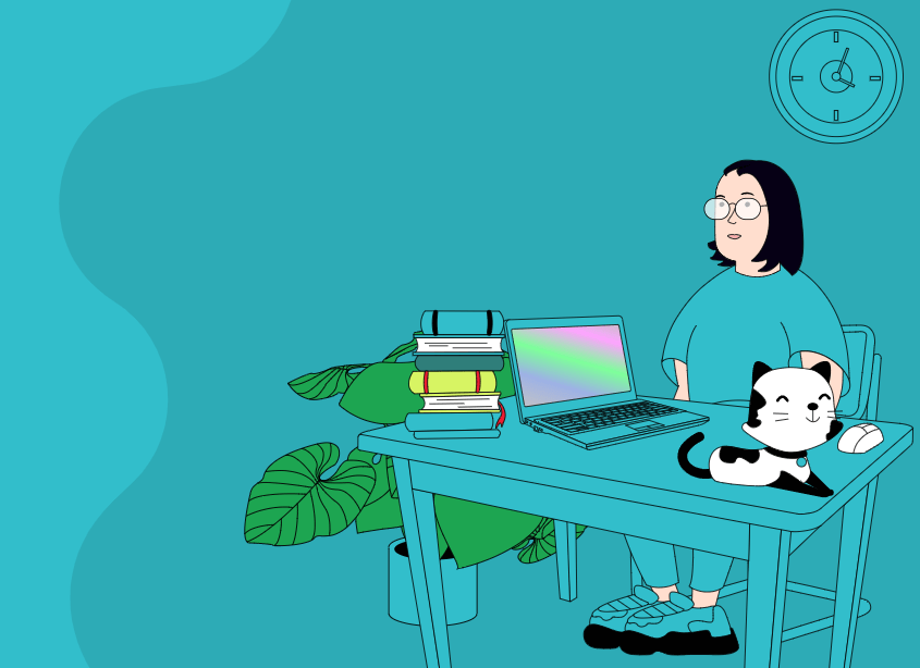 kobieta przy stole na którym jest laptop i kot
