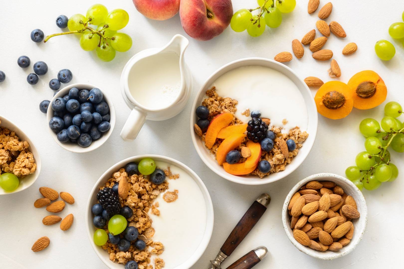 Healthy breakfast bowl with ingredients granola fruits Greek yogurt and berries healthy eating