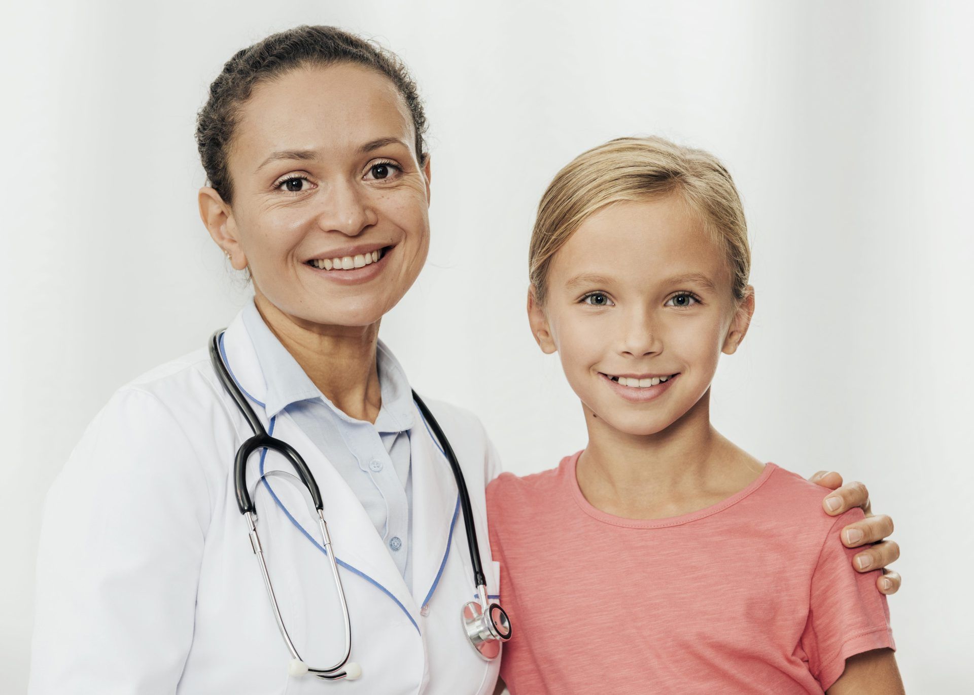 medium shot smiley girl doctor posing