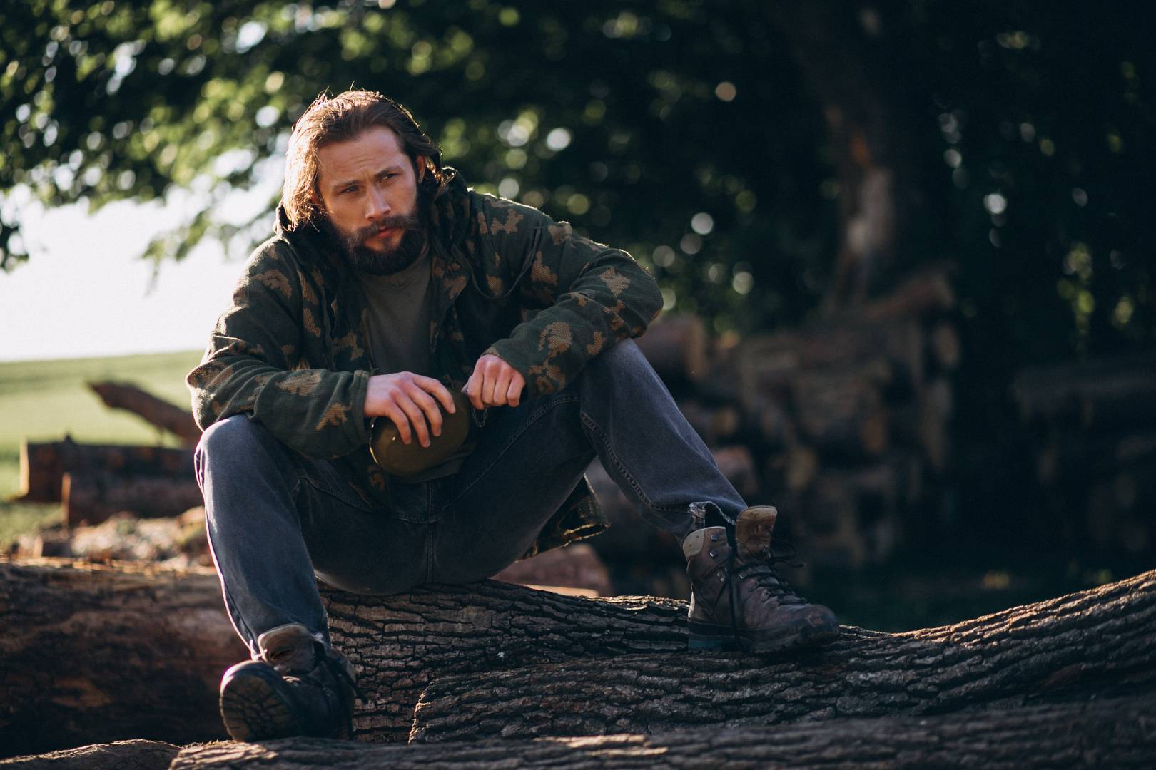 Man sitting on a log