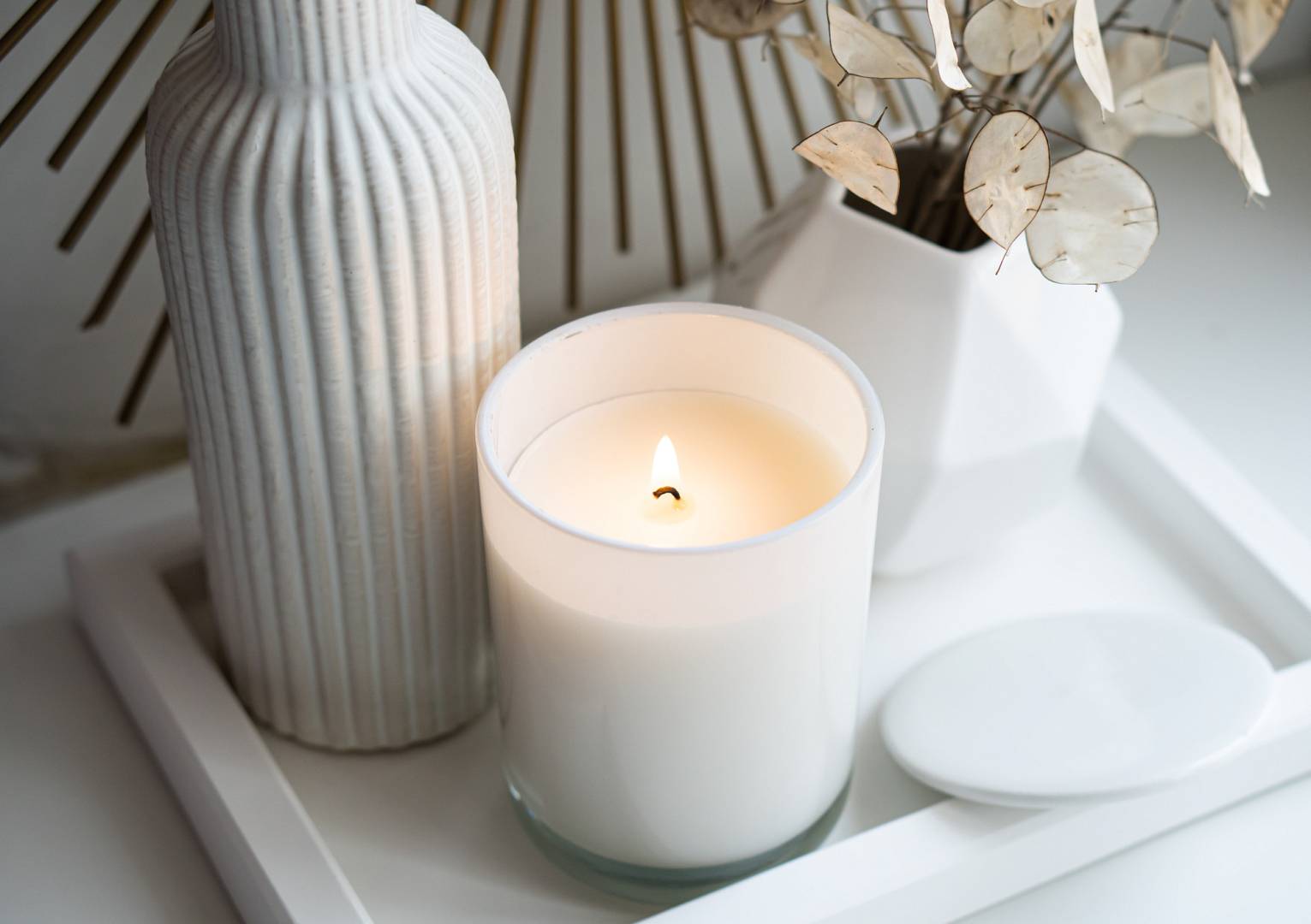 Luxurious white tray decoration, home interior decor with burning candle