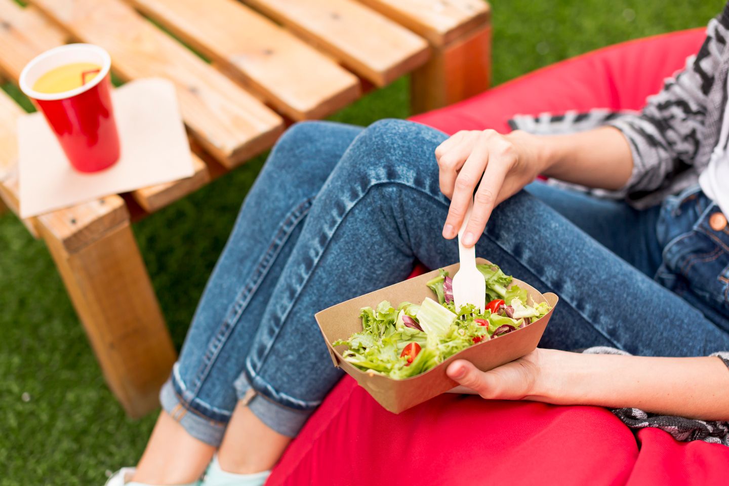 woman holding salad fork