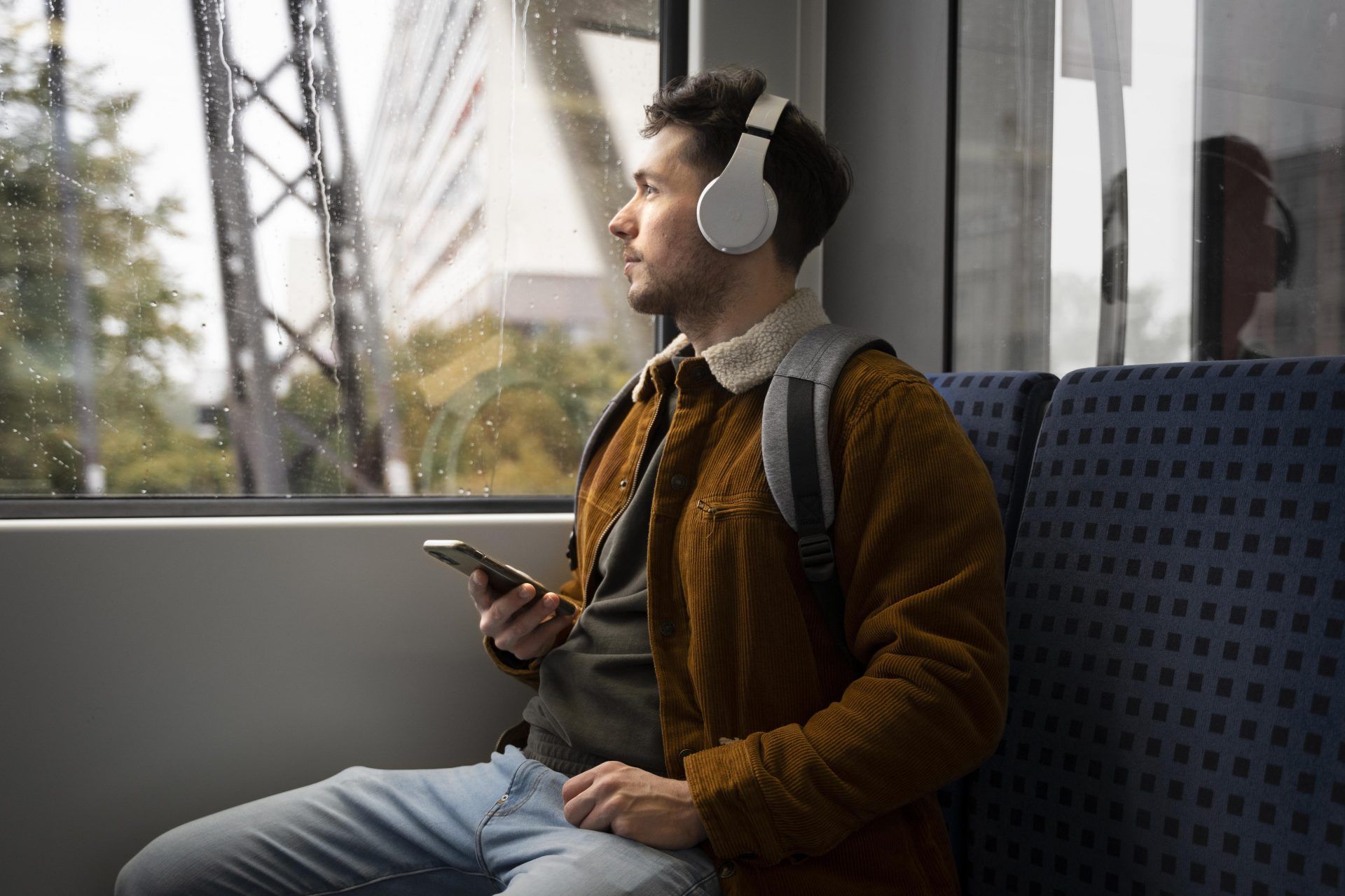 medium shot man wearing headphones