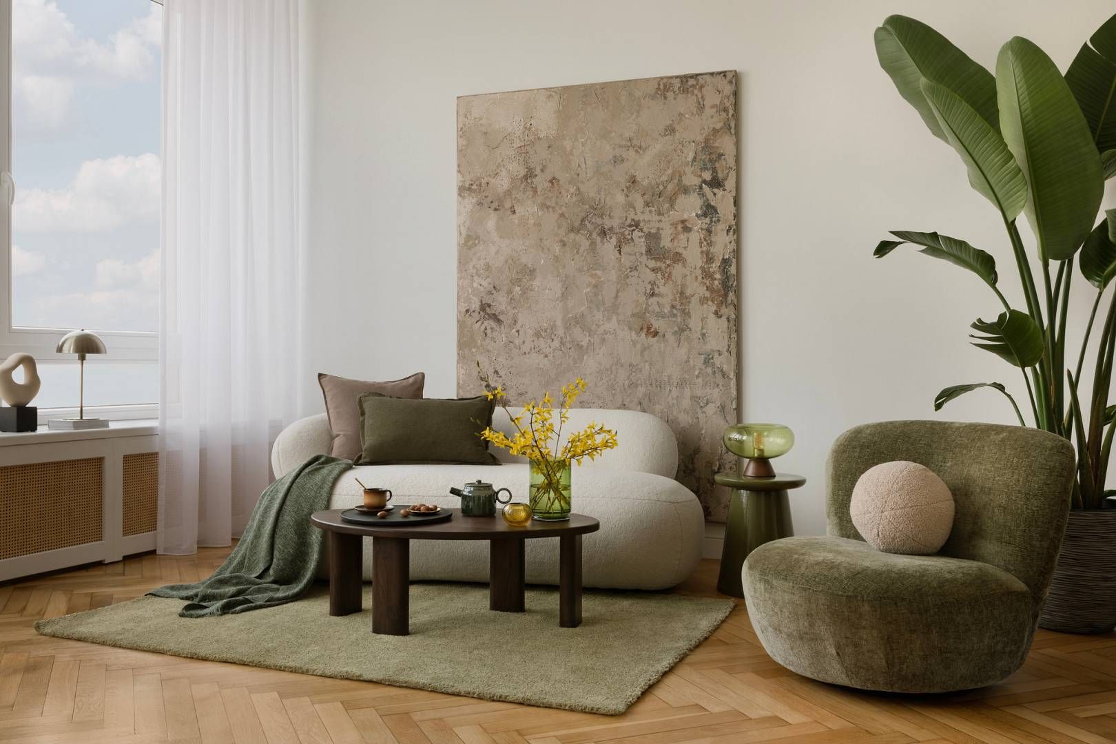 Light filled interior with white curved sofa, abstract textured