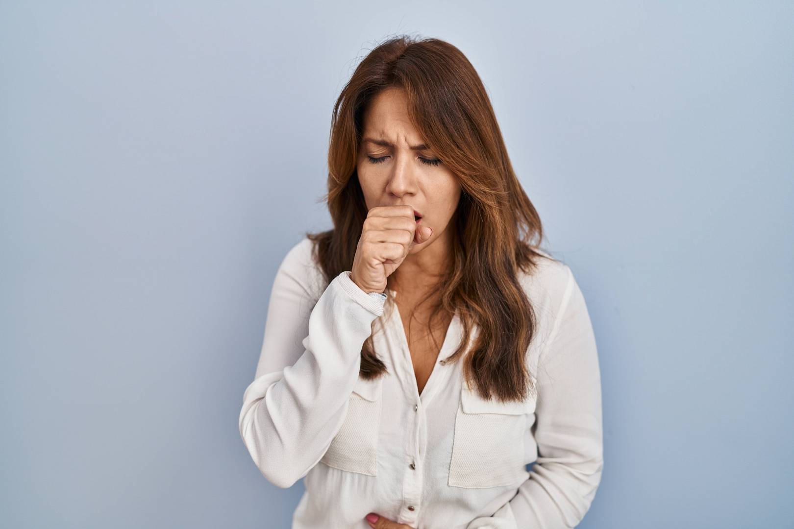 hispanic woman standing isolated background feeling unwell coughing as symptom cold bronchitis health care concept wp